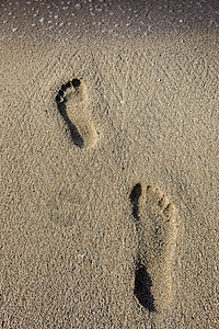沙土中人类足迹 赤脚 打印 烙印 脚步 海 走图片