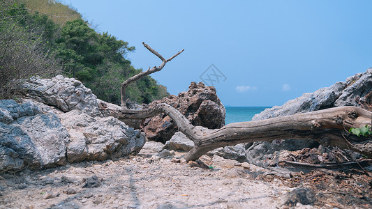 热带海滩 岩石和沙滩背景 蓝天 海浪 支撑 地平线图片