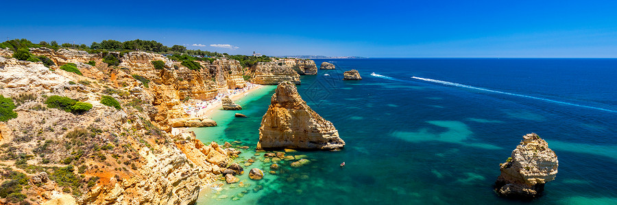 波尔蒂芒葡萄牙阿尔加维美丽的海滩 Marinha 海军海滩 是葡萄牙最著名的海滩之一 位于阿尔加维拉戈阿市的大西洋沿岸 旅行 海岸线背景