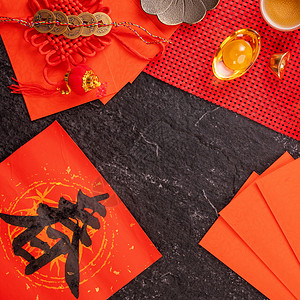 中国农历一月新年的设计理念-节日配饰 红包 红包 红包 顶视图 平躺 头顶上方 “春”字的意思是春天来了 锭 台湾背景图片