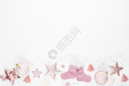 新年庆典和圣诞节背景粉红星星 圣诞装饰品顶级风景 桌子 季节背景图片