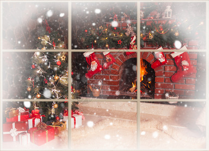 烟囱装饰品房间的圣诞壁炉 冬天 雪 砖 装饰品 袜子 时间 寒冷的背景