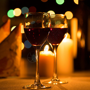 带蜡烛和葡萄酒的浪漫晚餐 浪漫的 发光的 假期 优雅背景图片