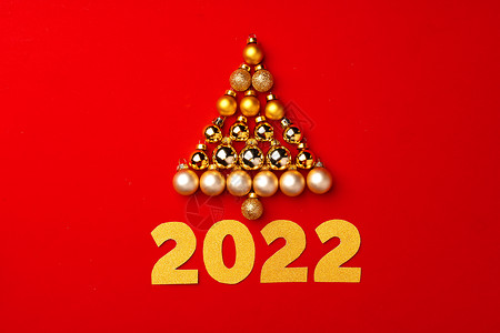 圣诞树由红本底的金做成 金的 装饰风格 喜庆的背景图片