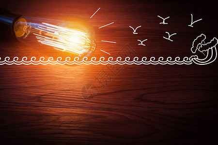 跳跃海豚灯泡创意背景设计图片