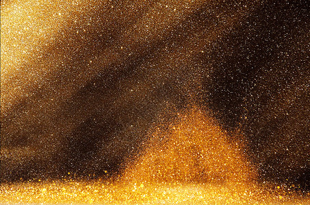 金色粒子光斑背景背景图片