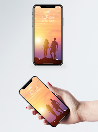 情侣一起看夕阳执子之手手机壁纸模板