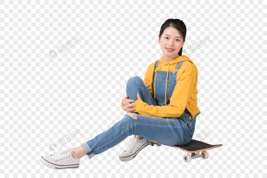 坐在滑板上的青春美少女图片图片