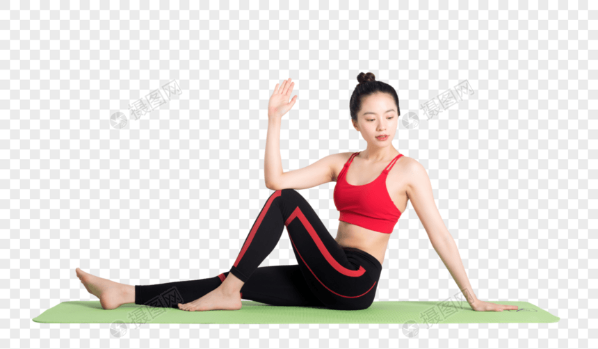 坐在瑜伽垫上做瑜伽动作的女性图片图片