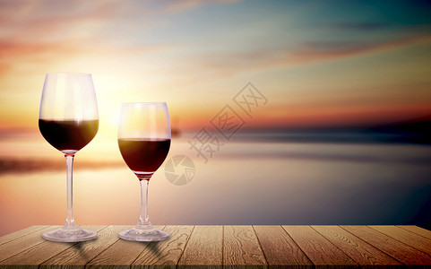 夕阳湖边夕阳下的红酒设计图片