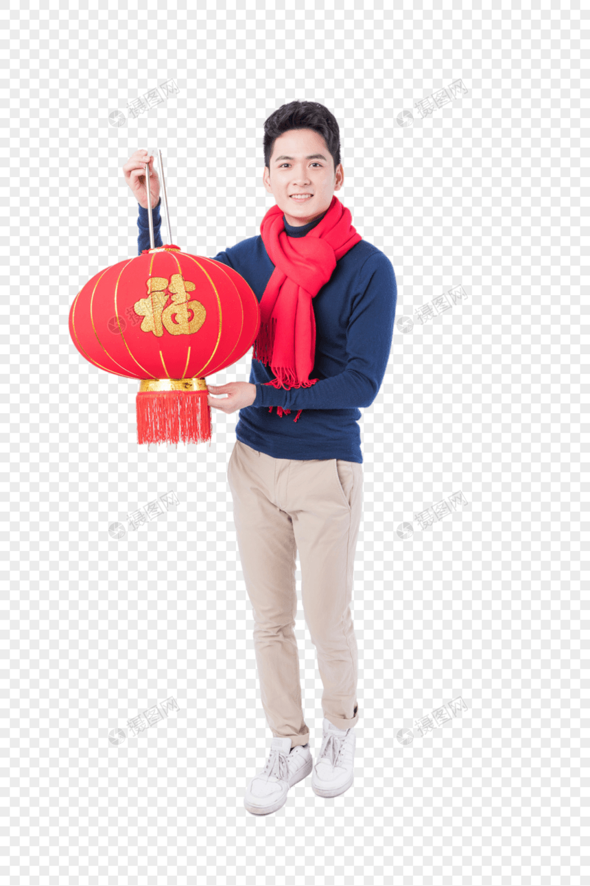 手拿新年挂饰的新年男性人像图片