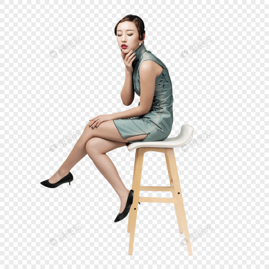 旗袍美女坐在椅子上图片