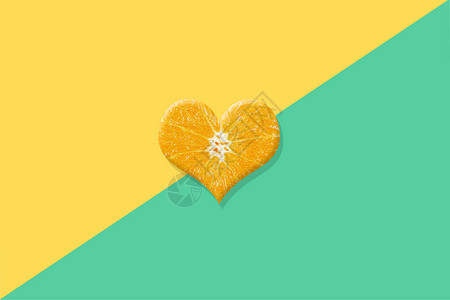 橙子切片心形水果背景设计图片