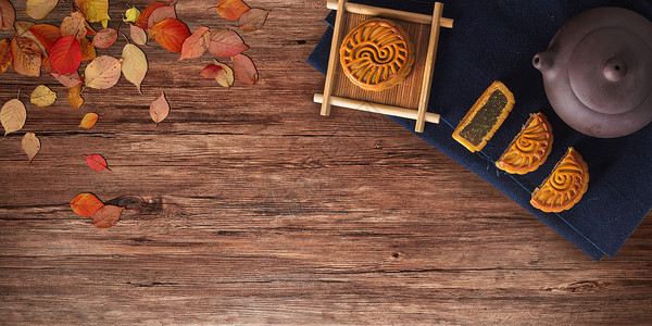 木板上的干茶月饼设计图片