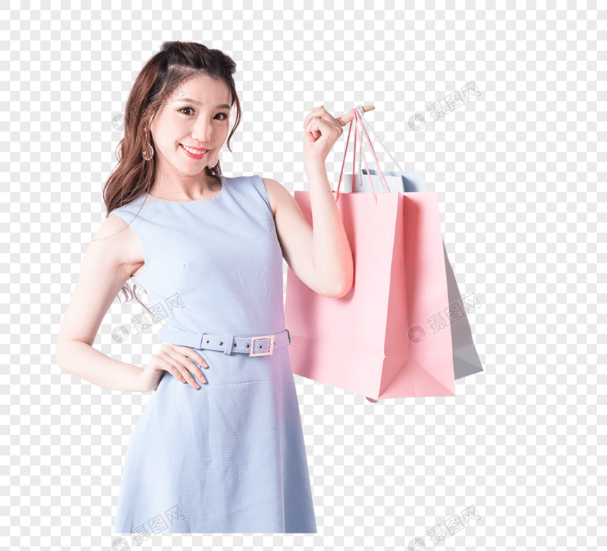 购物狂欢展示购物袋的女性图片