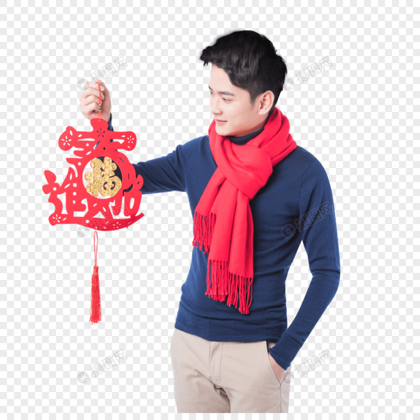 手拿新年挂饰的新年男性人像图片