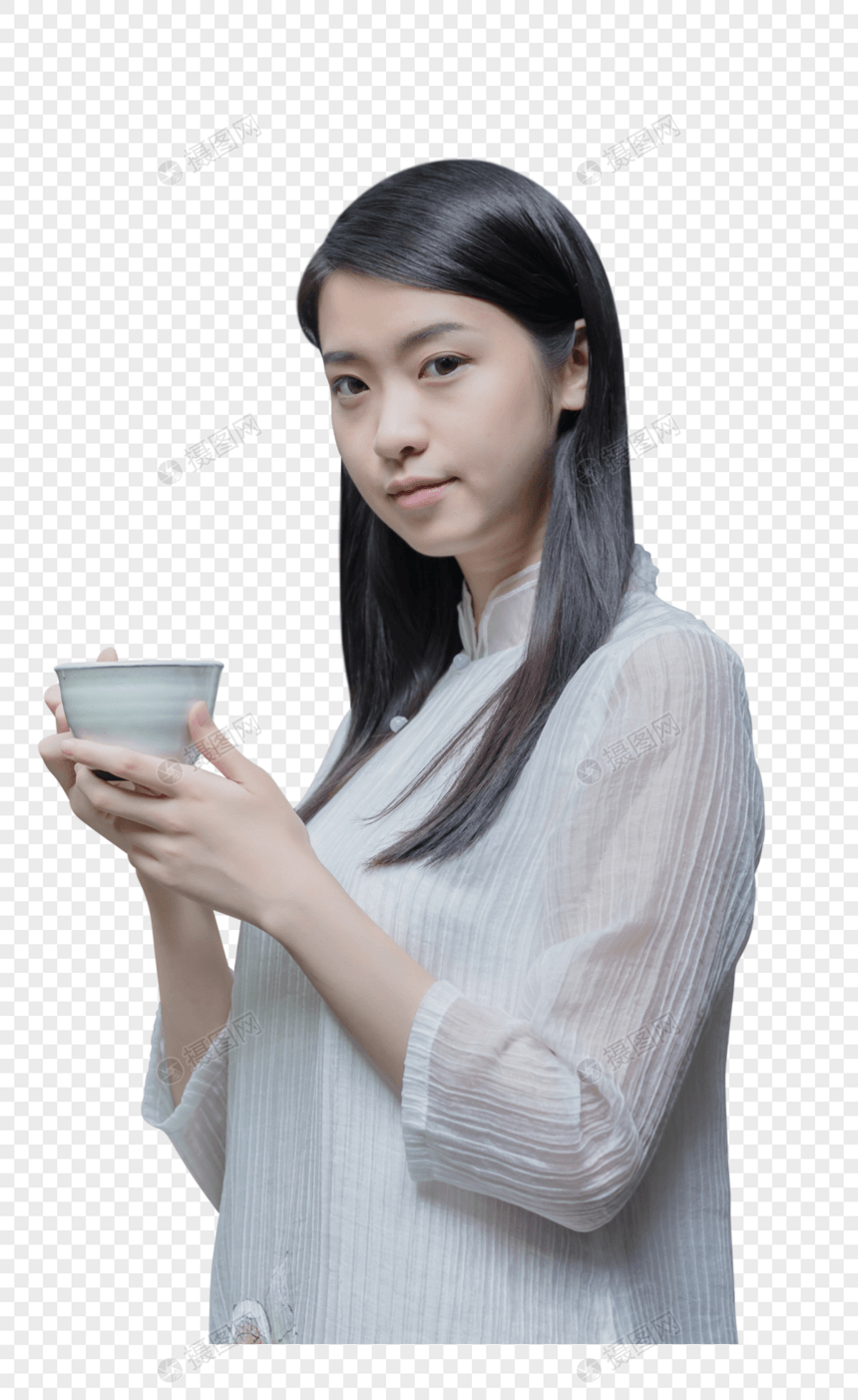 手捧茶杯的美女图片