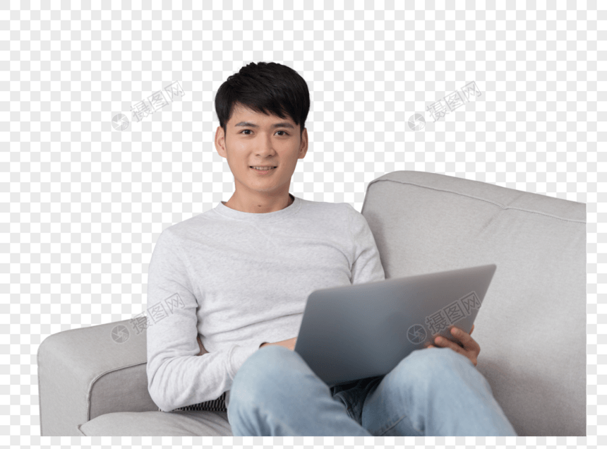 坐在沙发上玩电脑的男生图片