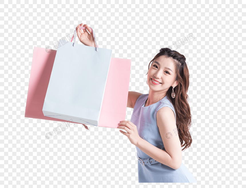 购物狂  欢展示购物袋的女性图片
