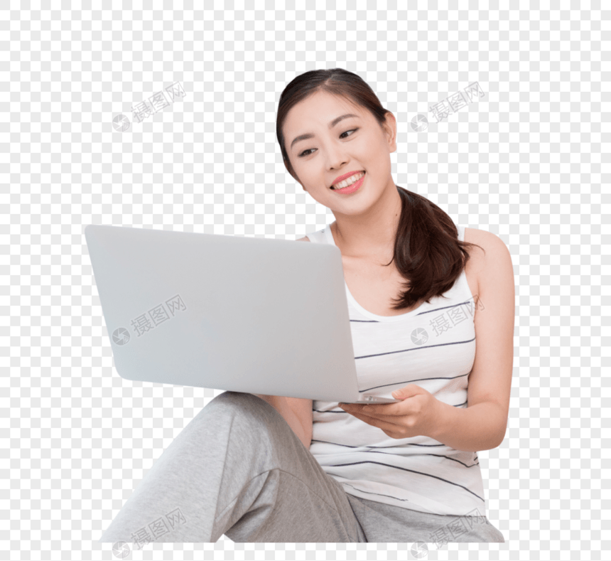 坐在客厅窗台使用笔记本电脑的美女图片