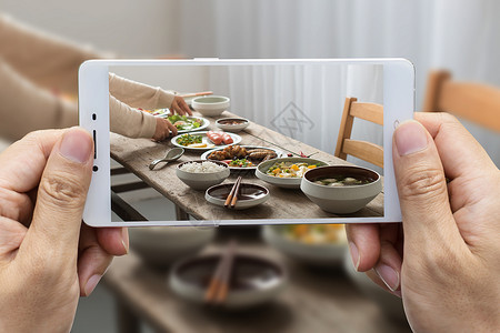 餐桌人手机拍摄设计图片
