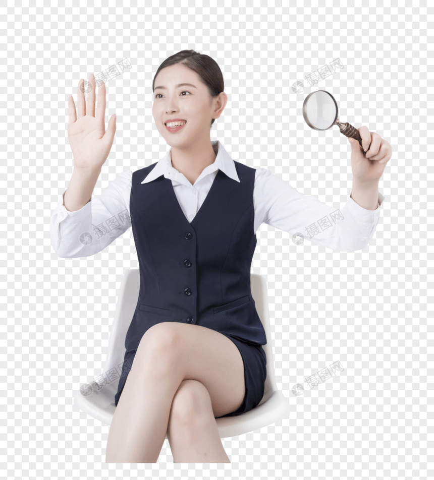 商务女性用放大镜图片