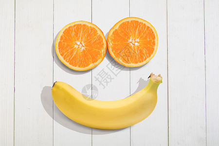 白色背景下的水果水果笑脸设计图片