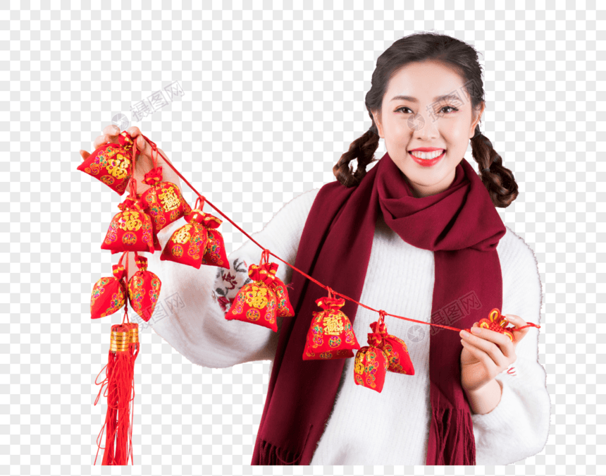 女性手拿新年装饰图片