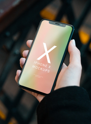 x捕梦网手持苹果手机样机素材模板