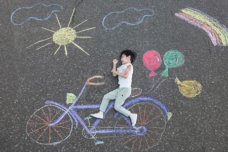 骑着玉兔的男孩骑自行车的男孩设计图片