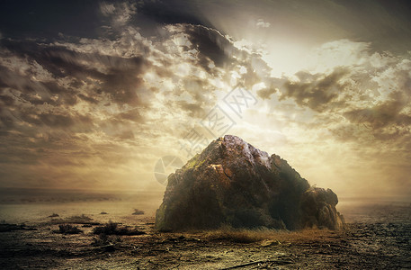 海滩岩石日落荒漠设计图片