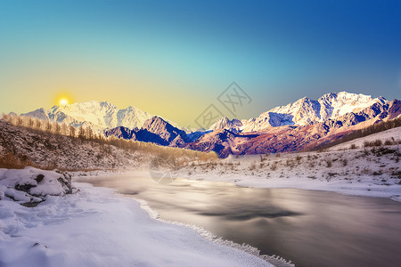 夕阳雪山冬季雪景设计图片