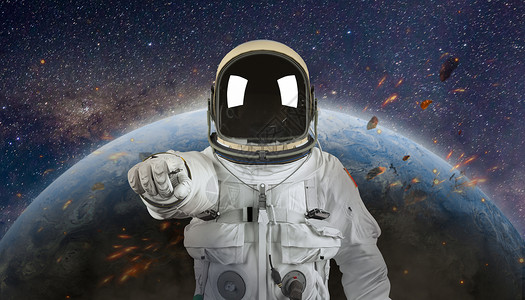 太空宇航员飞向宇宙浩瀚无垠高清图片