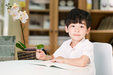 写作业的小学生写作业的儿童设计图片