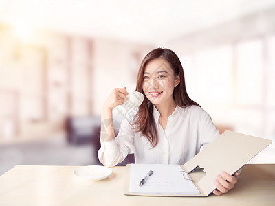 咖啡阅读商务女白领设计图片