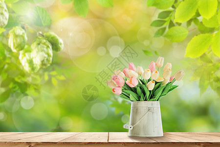花瓶绿叶粉色花春天设计图片