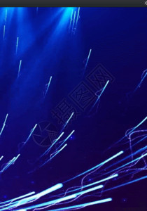 激光表演蓝色光束粒子飞舞背景高清图片