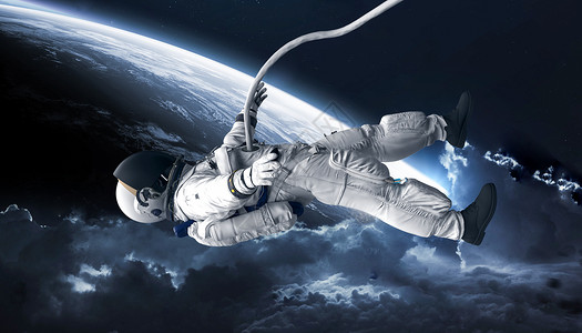 太空宇航员行走背景图片