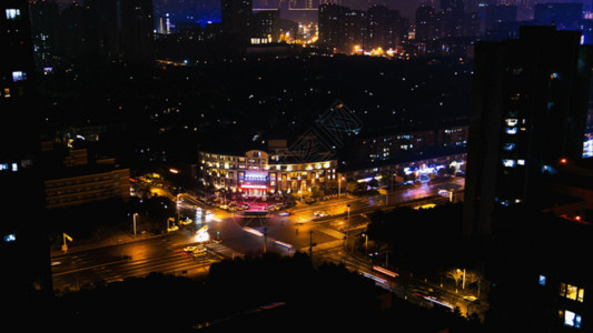 城市夜晚马路俯拍十字路口车流夜景延时GIF高清图片