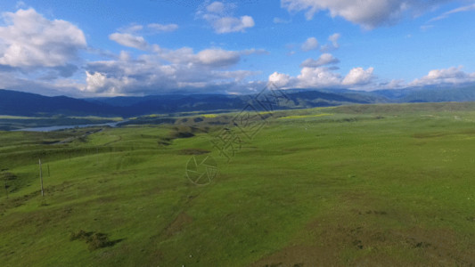 新疆草原风景图新疆航拍山野草原农田水利公路GIF高清图片