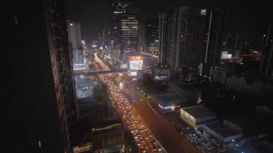建筑拍摄夜景城市中心马路车流GIF高清图片