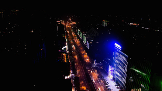 城市暖光夜景实拍道路交通穿梭延时摄影GIF高清图片