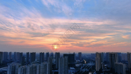 夕阳边的建筑美丽晚霞航拍城市建筑GIF高清图片