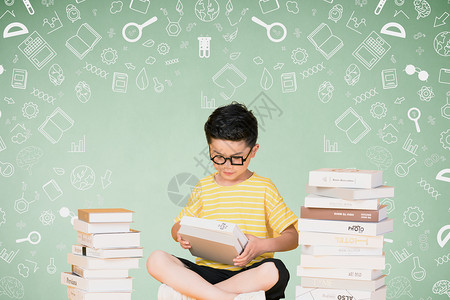 孩子坐在书上世界读书日设计图片