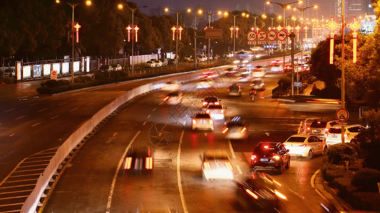 立面灯光素材实拍城市下班晚高峰车流延时素材GIF高清图片