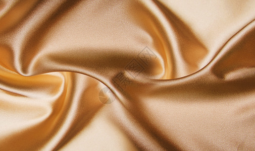 焦糖布蕾金色丝绸背景设计图片