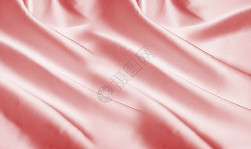 亚麻粉粉色丝绸背景设计图片