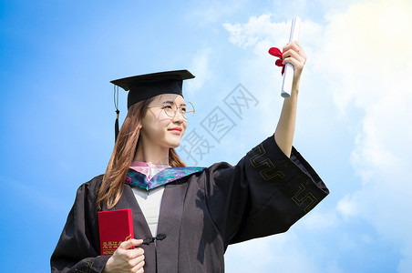 青年女性学士服手拿毕业证书毕业季设计图片