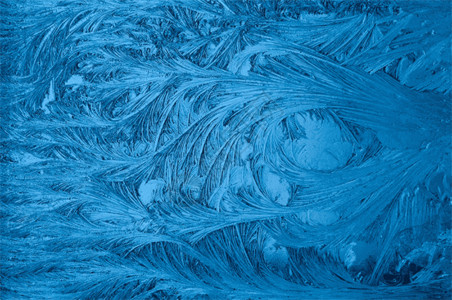 蓝色花案窗户上的冰花gif高清图片
