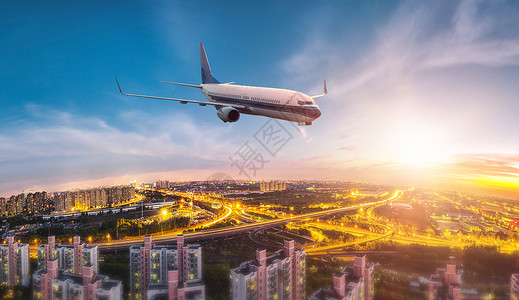 城市上空的飞机背景图片